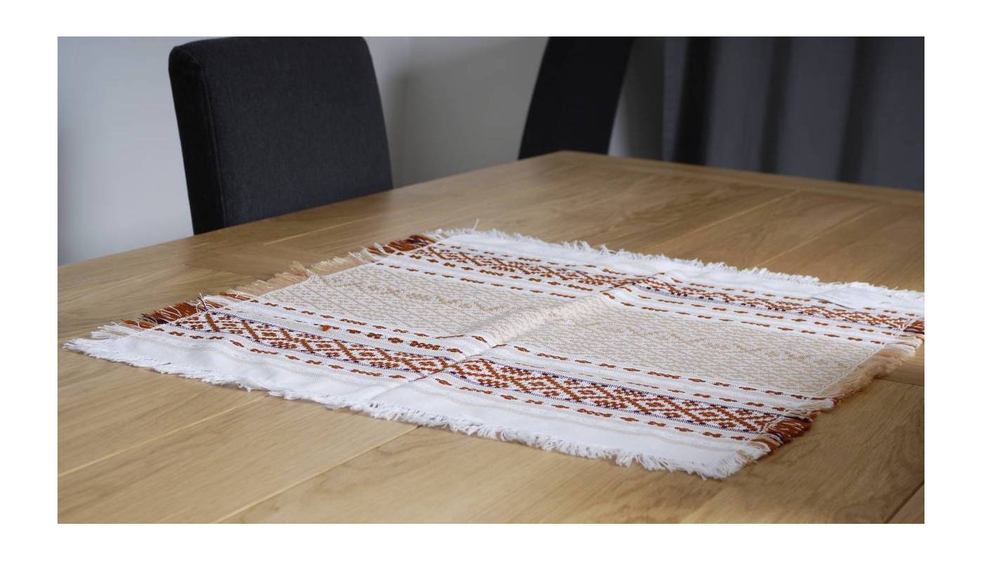 Hand-woven beige cotton napkin