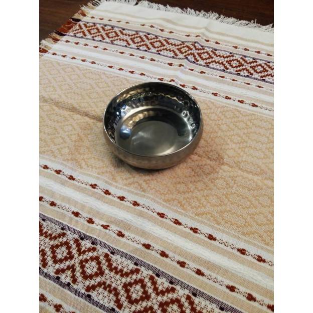 Hand-woven beige cotton napkin