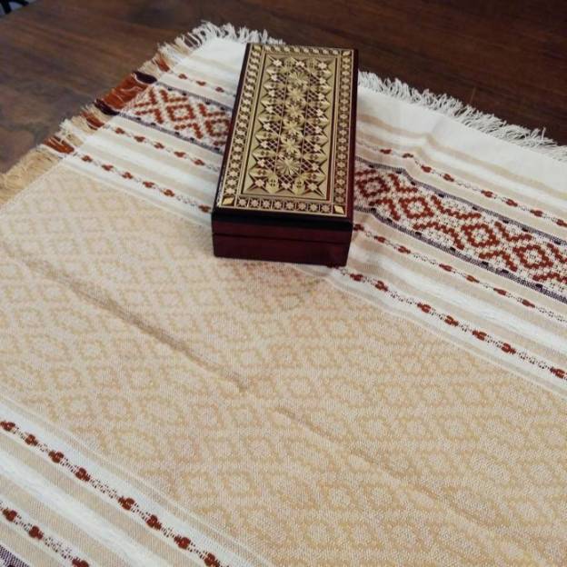 Hand-woven beige cotton napkin